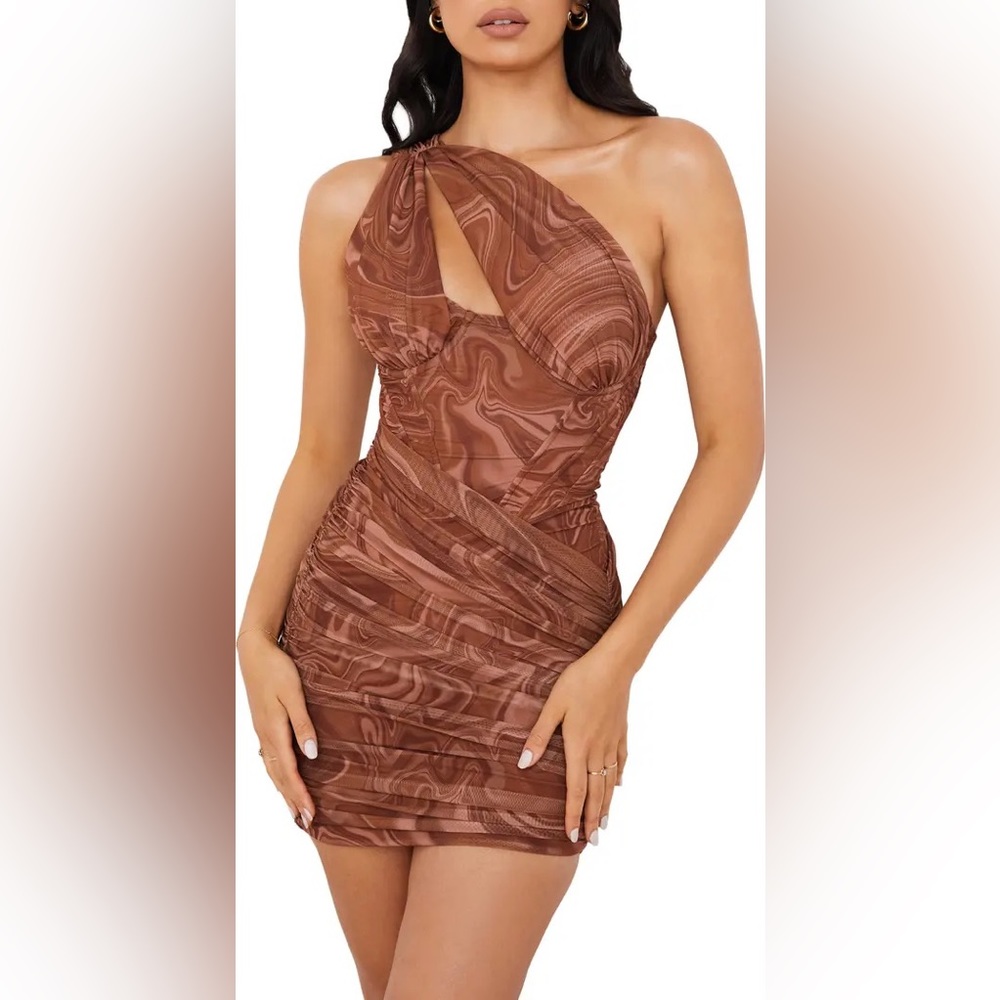 Mistress rocks orange bodycon dress with side cutouts